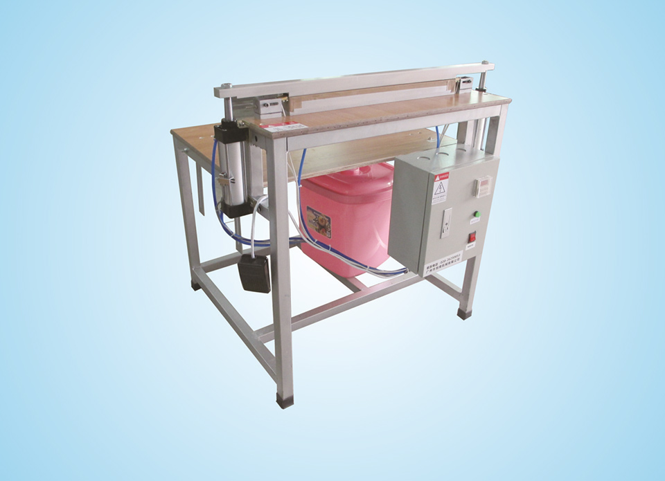 Diaper & Sanitary Napkin Sealing Machine